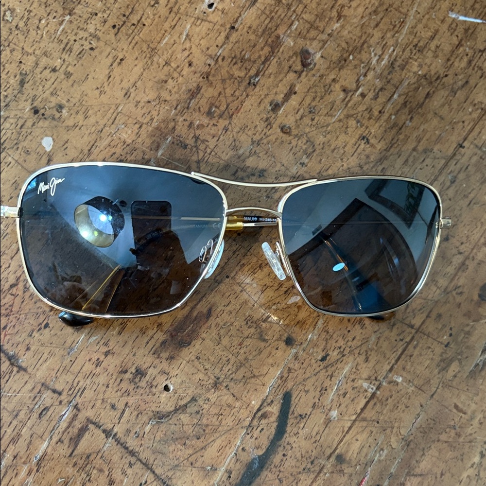 Maui Jim Gold Frame Sunglasses with Dark Lenses